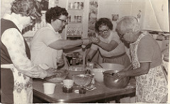 Old photo of people cooking