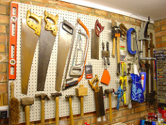 Tools on a pegboard wall